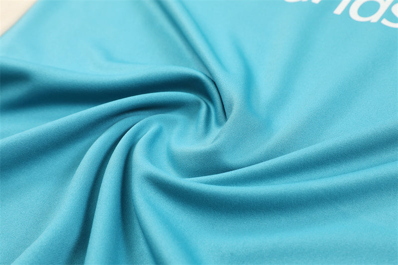 Buzo Completo Marsella Cyan Blanco