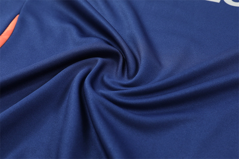 Buzo Completo Manchester United Azul Naranjo