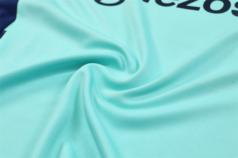 Buzo Completo Manchester United Celeste con Cierre Azul