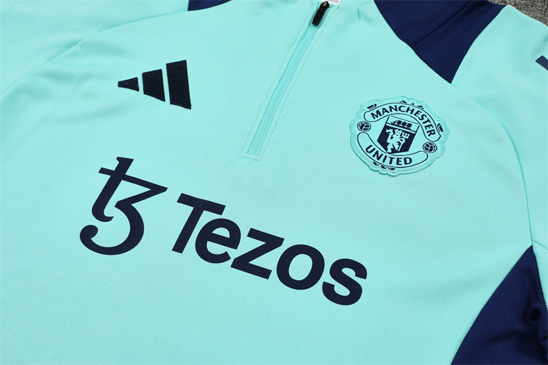 Buzo Completo Manchester United Celeste con Cierre Azul