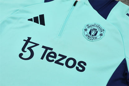 Buzo Completo Manchester United Celeste con Cierre Azul